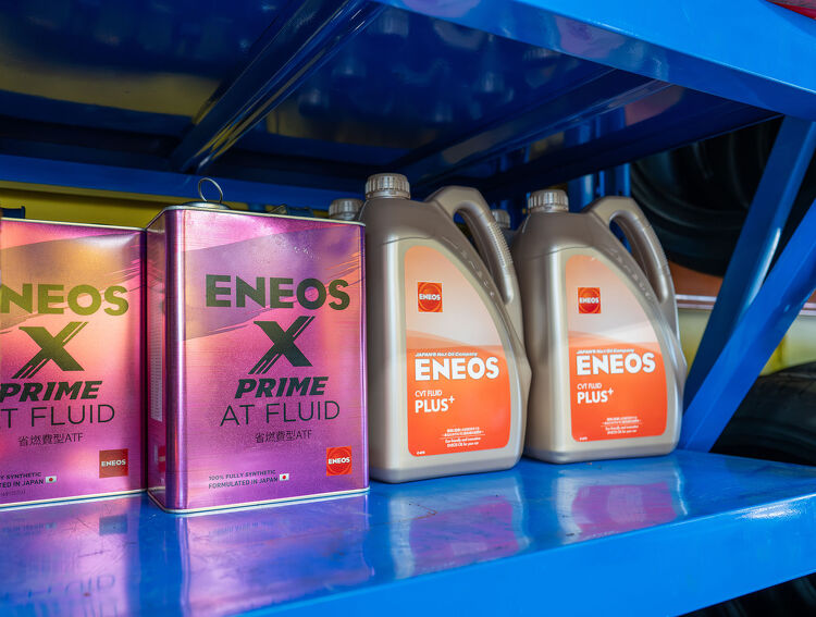 ENEOS engine oil and transmission fluid products on a shelf at Hamilton Auto Centre